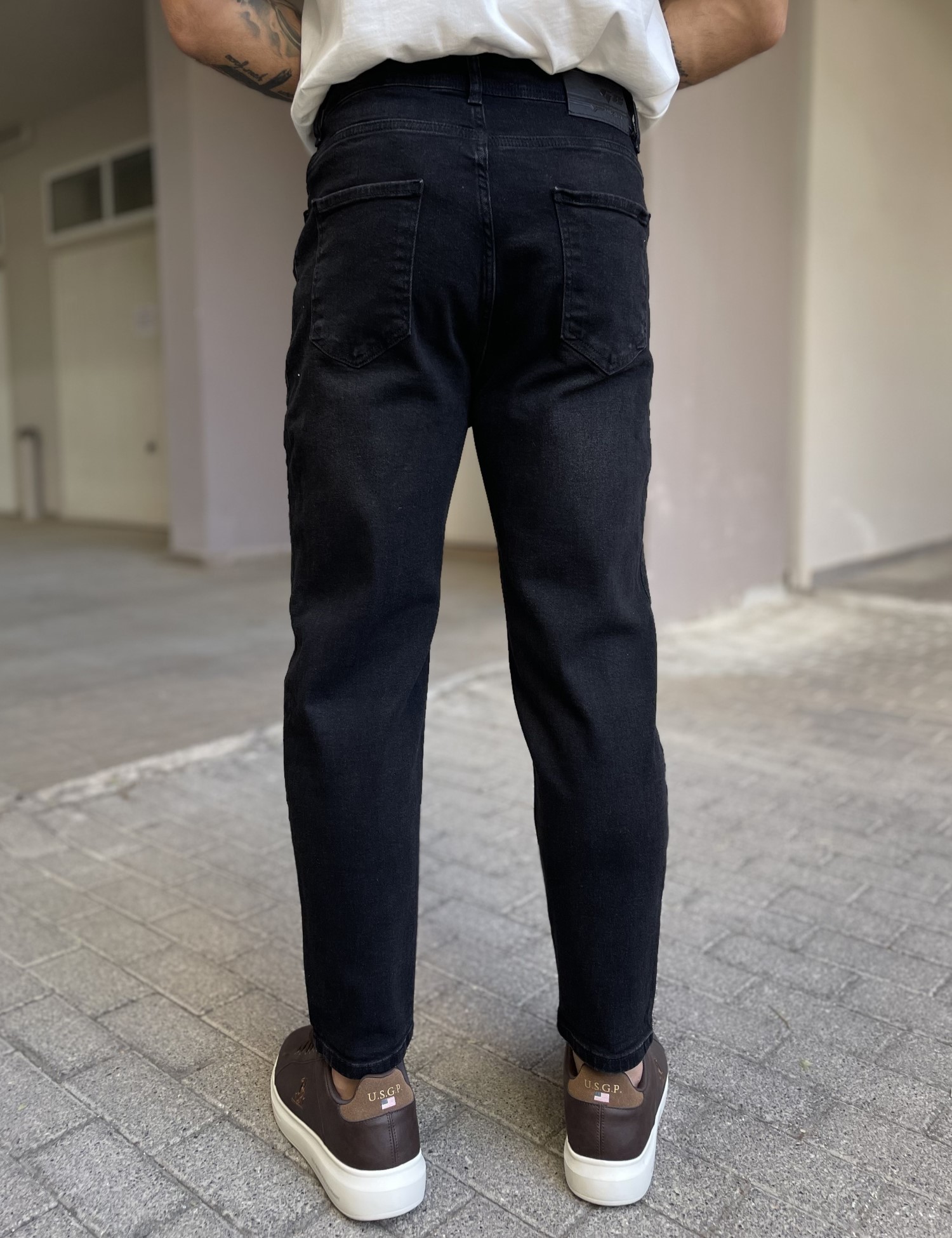 Ανδρικό μαύρο πλυμένο ελαστικό loose τζιν πεντάτσεπο με φερμουάρ G88115 φωτογραφία